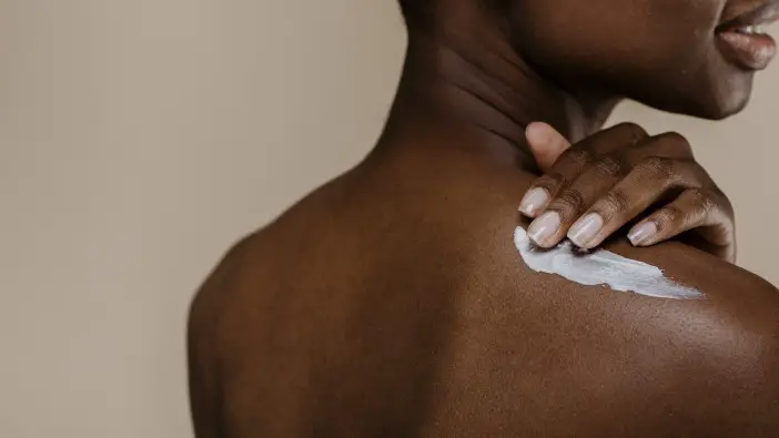 how to put lotion on your back