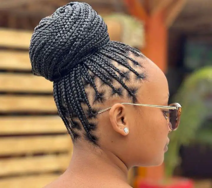 small knotless braids in a bun - africana fashion